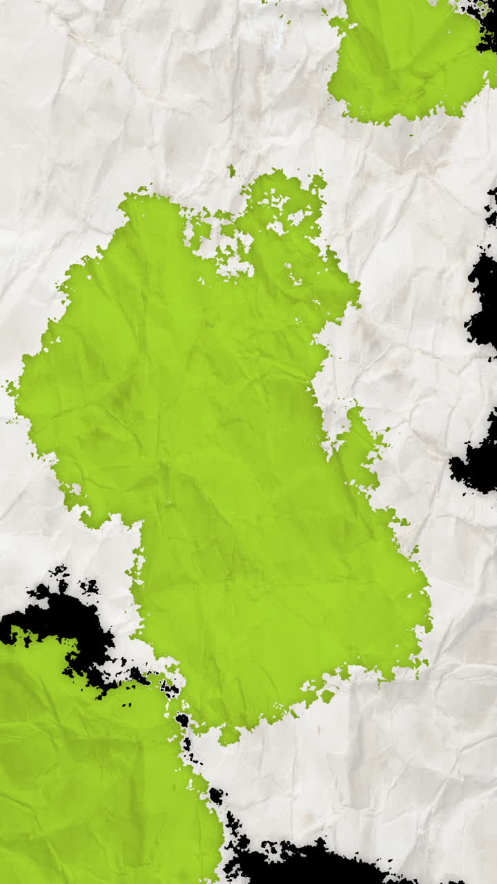 Animated Crumpled Paper Tearing Away to Reveal Green