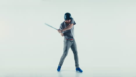 caucasian professional baseball player batter wearing generic uniform hitting a ball isolated on white background. 4k uhd 60 fps slow motion