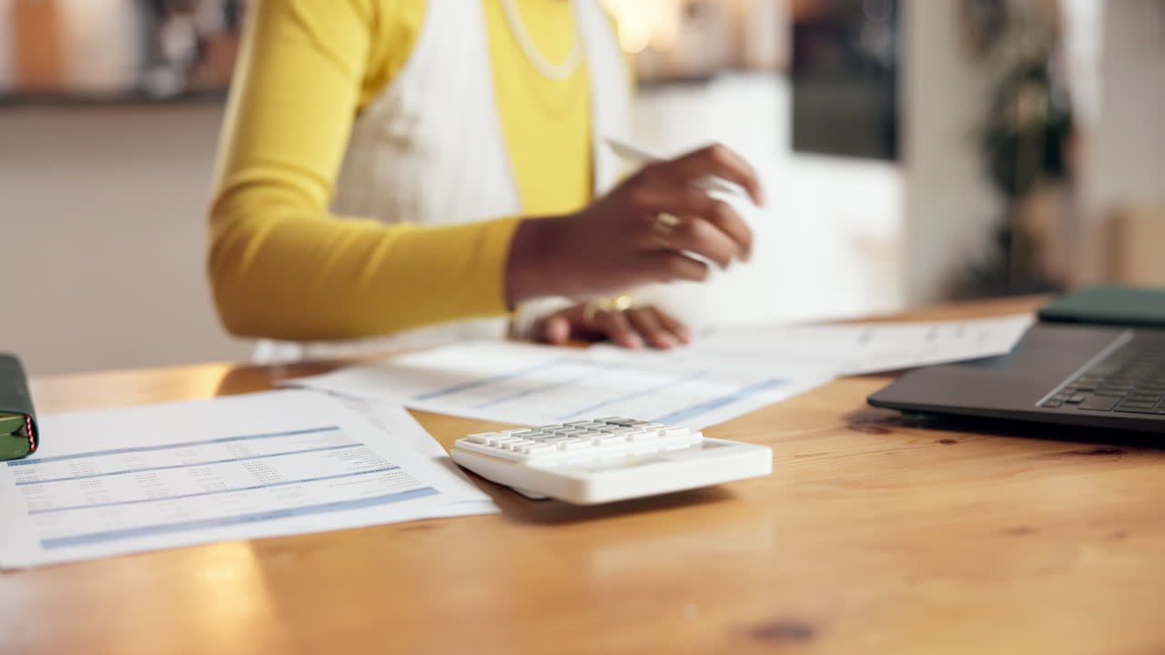 Woman working on finances at home