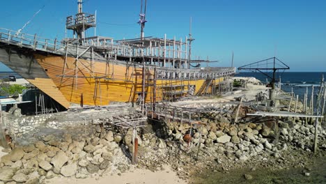 Tracking-View-of-Bali-Melasti-Ungasan-Shipwreck-the-Beach,-Sunny-Day