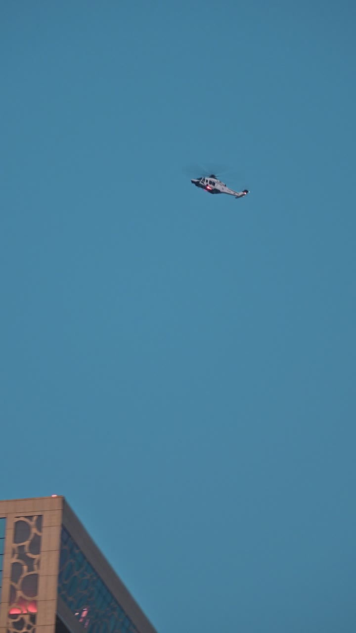 Dubai Police helicopter seen patrolling over the city