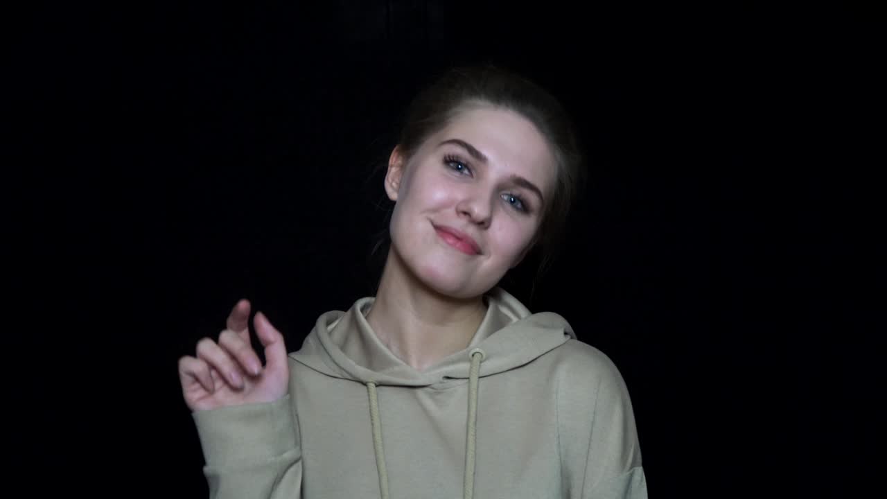 Woman waving hello