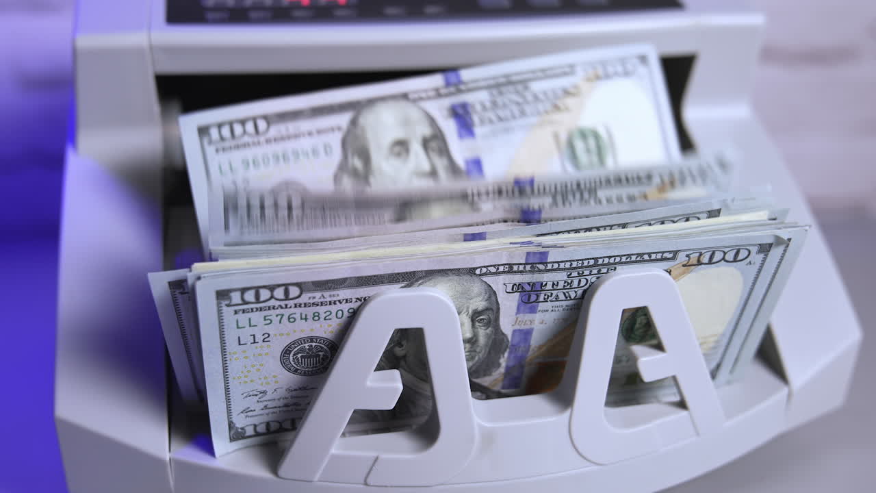 Dollar counting machine for banking financing. Calculating credit investments.