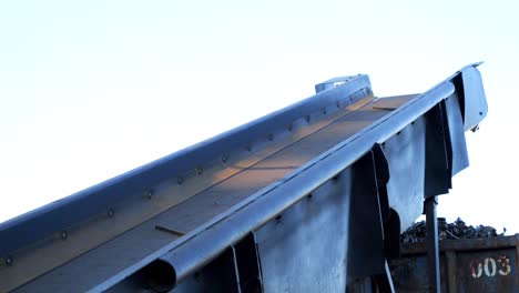 Working-car-shredder-machine,-close-up-of-empty-conveyor-belt