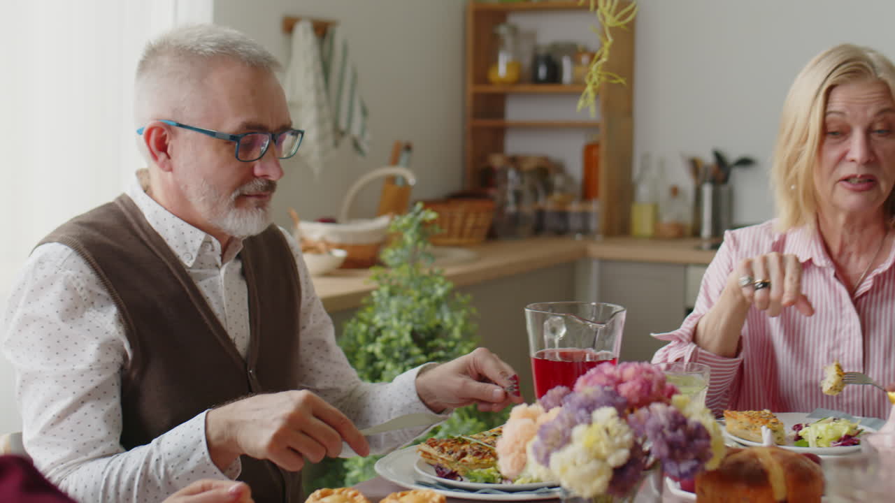 Family Eating Easter Dinner at Home