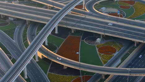 stunning structure of sheikh zayed road in dubai, uae at daytime - aerial drone