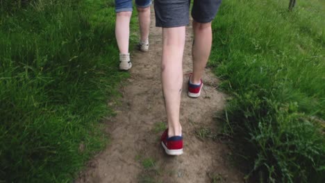 Couple-walking-along-Path-in-Greenbooth-Reservoir,-England,-UK