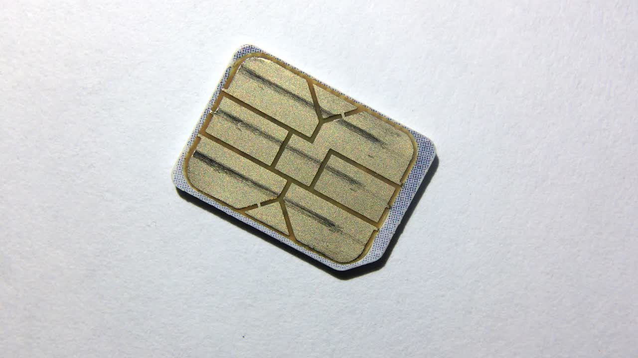 Macro shot of rotating sim card.