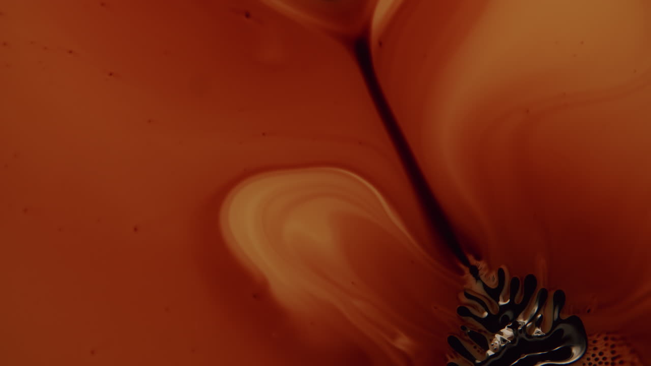 추상적 형태와 모양을 형성하는 이상한 점성 액체의 탑 샷