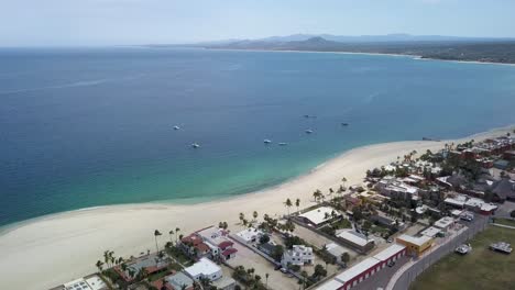 beachfront property on tropical mexico beach in baja california, aerial flying view