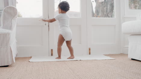 happy baby learning to walk toddler exploring home curious infant walking through house enjoying childhood