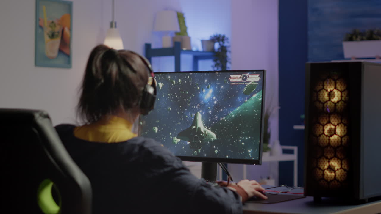 Woman gamer puting headset starting to play space shooter video game