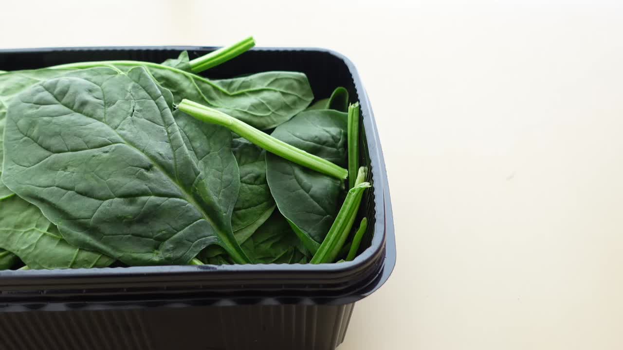 Spinach in a container