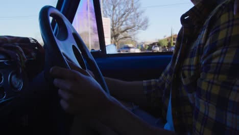 young man on a road trip in pick-up truck