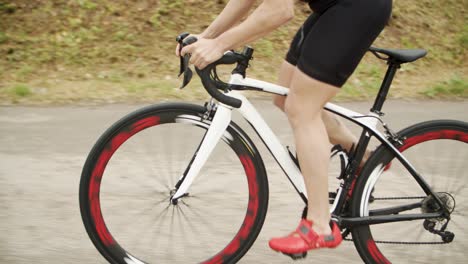 sportsman and sportswomen riding bicycles