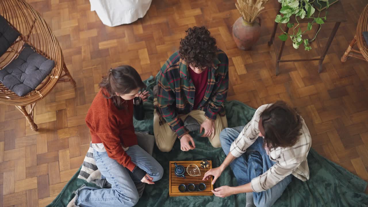 Friends Enjoying a Tea Ceremony at Home