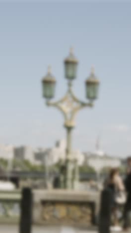 defocused vertical video westminster bridge hungerford charing cross bridges london uk