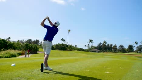 golfer drives a straight shot in slow motion