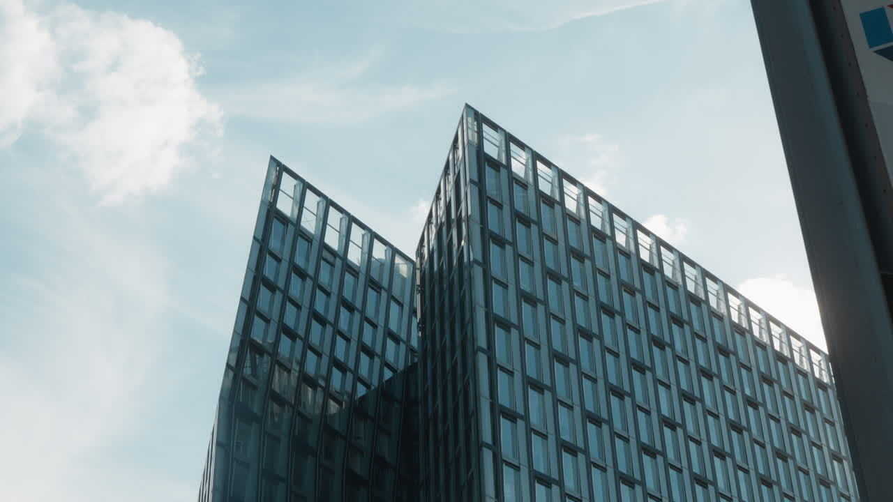 Modern skyscraper Tanzende Türme in Hamburg against blue sky. Ideal for urban development projects or architecture showcases. St. Pauli, Hamburg