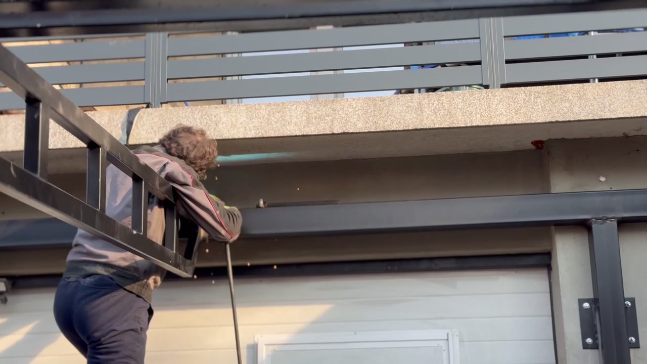 Welder welds a metal structure without a protective mask