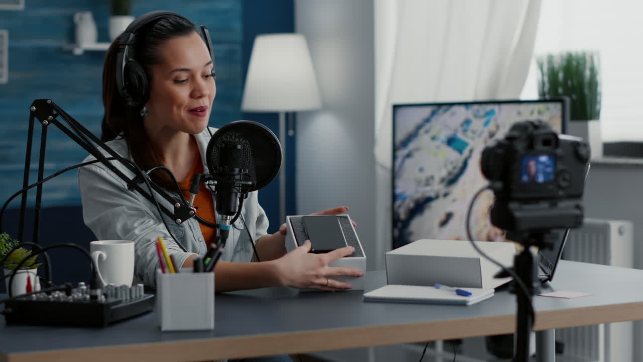 Famous social media star doing unboxing video of modern smartphone