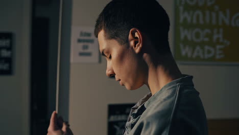 teenager in a bedroom