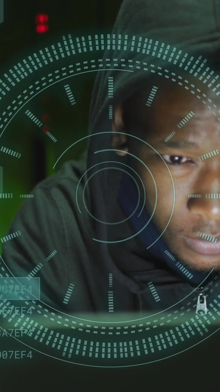 Animation of data processing over african american male hacker in server room
