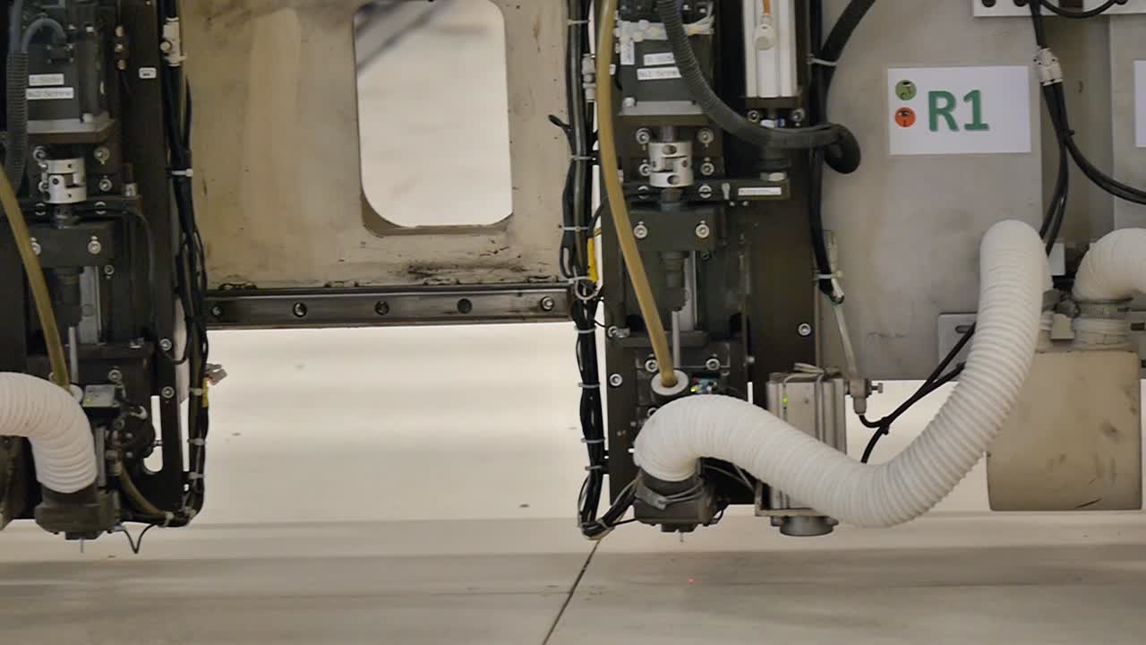 Robot Working in Heavy Metal Factory