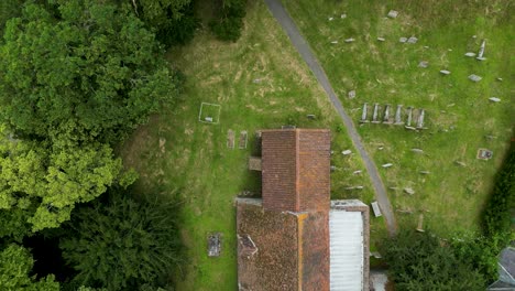 a top-down pan over all saints church, west stourmouth