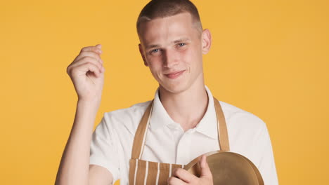 young waiter asking for money