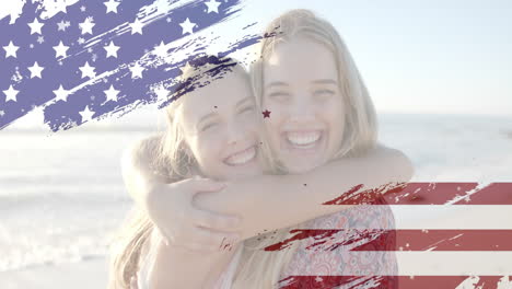 animation of flag of usa and stars over caucasian female friends on beach