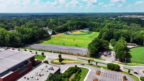 Fly-above-car-parks-and-sports-fields-in-suburbs