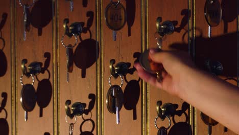 lots of keys at the reception desk in the hotel