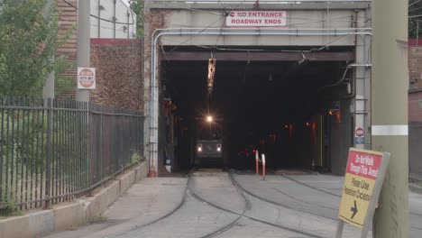 septa 13 trolley emerges from 40th street station tunnel, philadelphia, pa