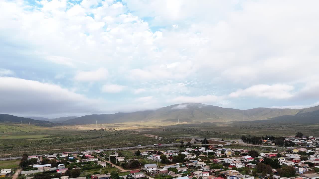 Aerial View of a Small Town Nestled in a Mountain Valley