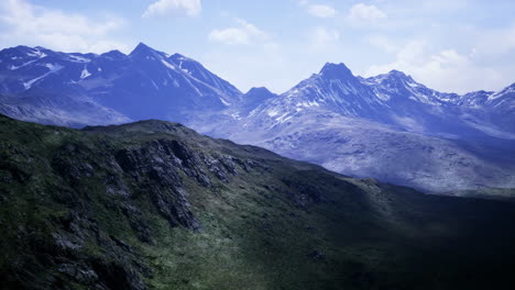 majestic mountain range under a bright sky at dawn