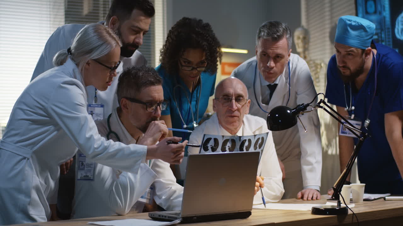 Medical Team Discussing X-Ray Images