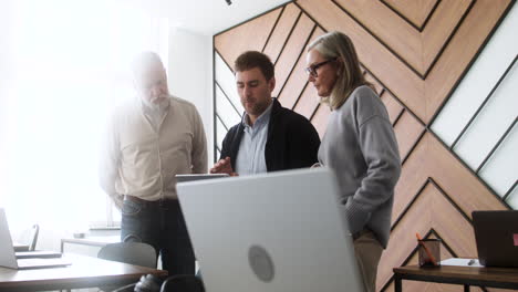 male teacher and students in classroom