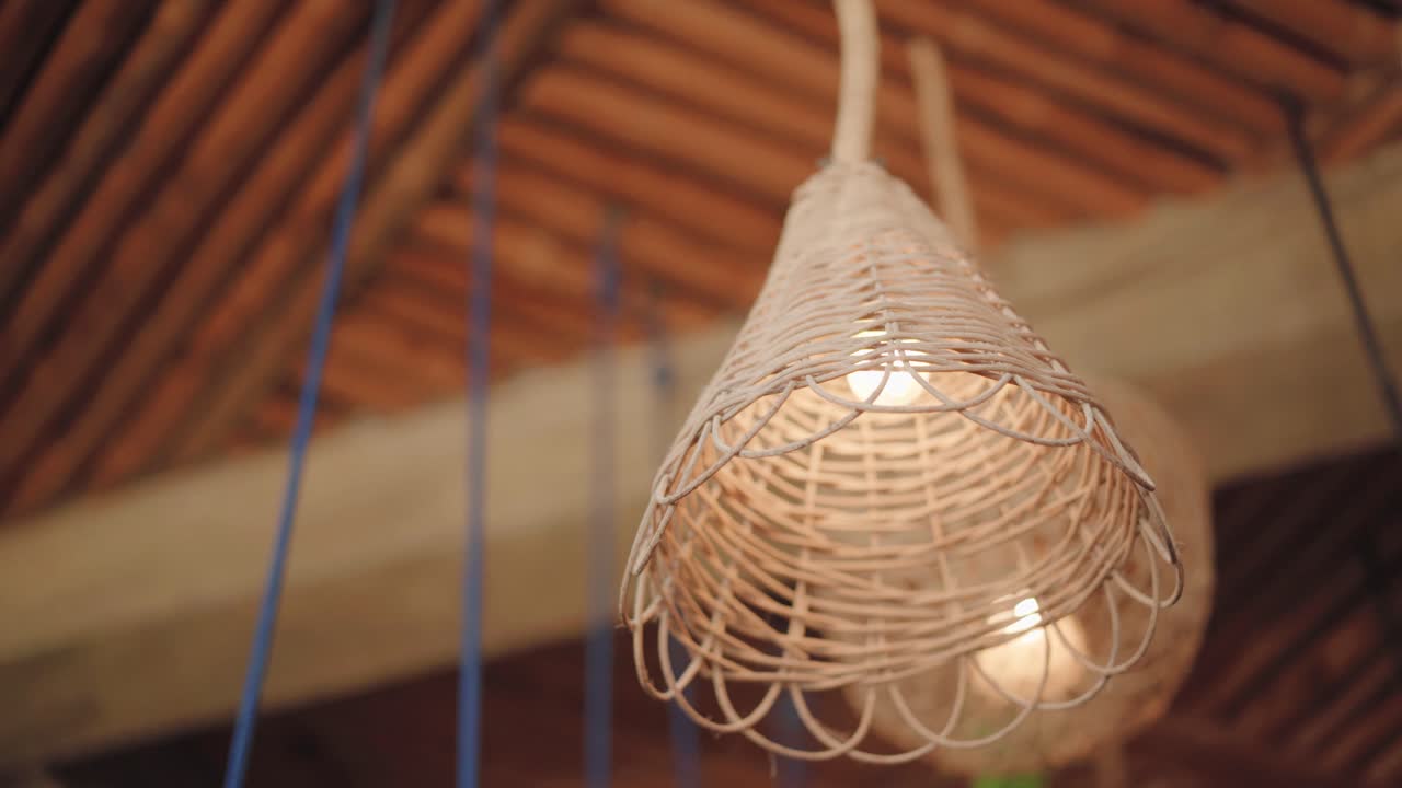 Rattan Woven Pendant Lights Hanging In A Restaurant - Close Up Shot