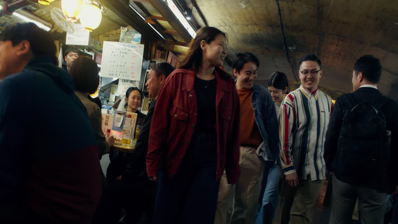 Group of Friends Exploring a Japanese Night Market