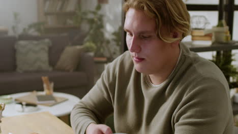 teenager using tablet on the table