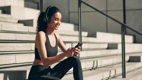 Headphones,-woman-and-phone-on-steps-for-fitness