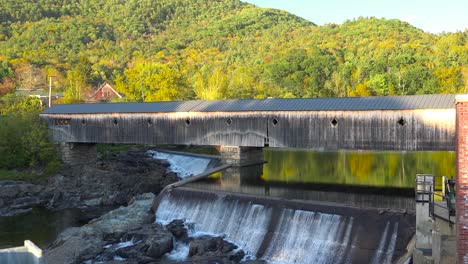 A-beautiful-wooden-covered-bridge-over-a-river-in-New-England