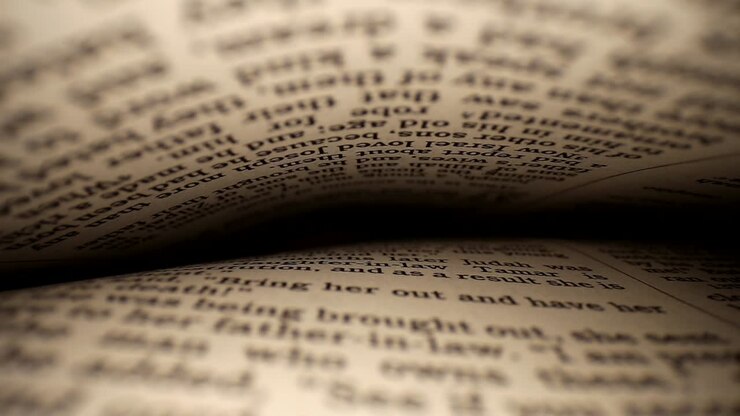 Pulling a lens out of a book centered on page