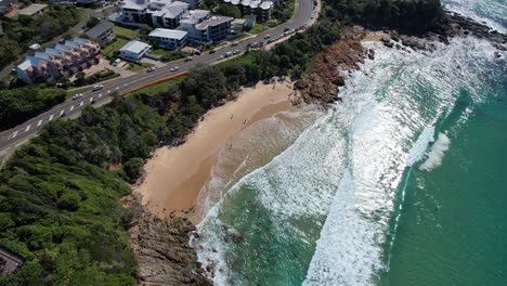 Traffic-On-The-Coastal-Road-Of-Coolum-Beach-In-Sunshine-Coast,-Noosa-Region,-Queensland,-Australia