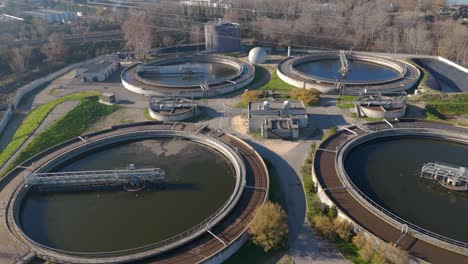 aerial establishing shot of a large water purification plan in avignon