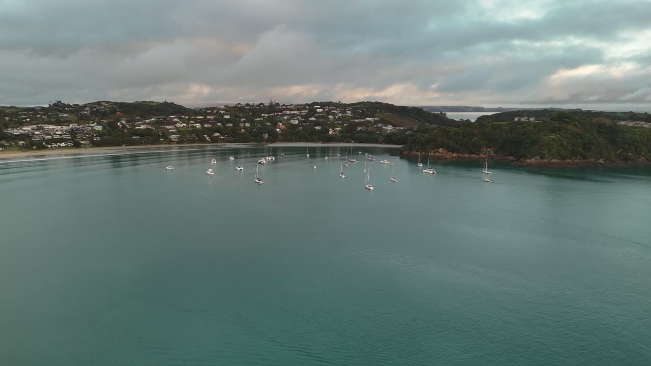 Birds eye view over Oneroa bay and moored sailboats on Waiheke Island in northern New Zealand