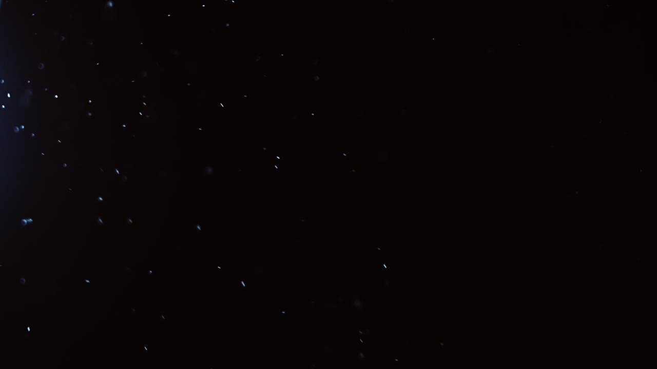 fondo negro de 4k de partículas, polvo y humo en movimiento