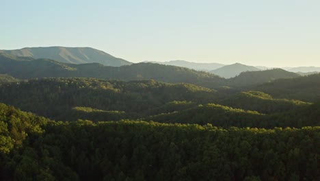 aerial forward sunrise in the smoky mountains in tennessee, national park