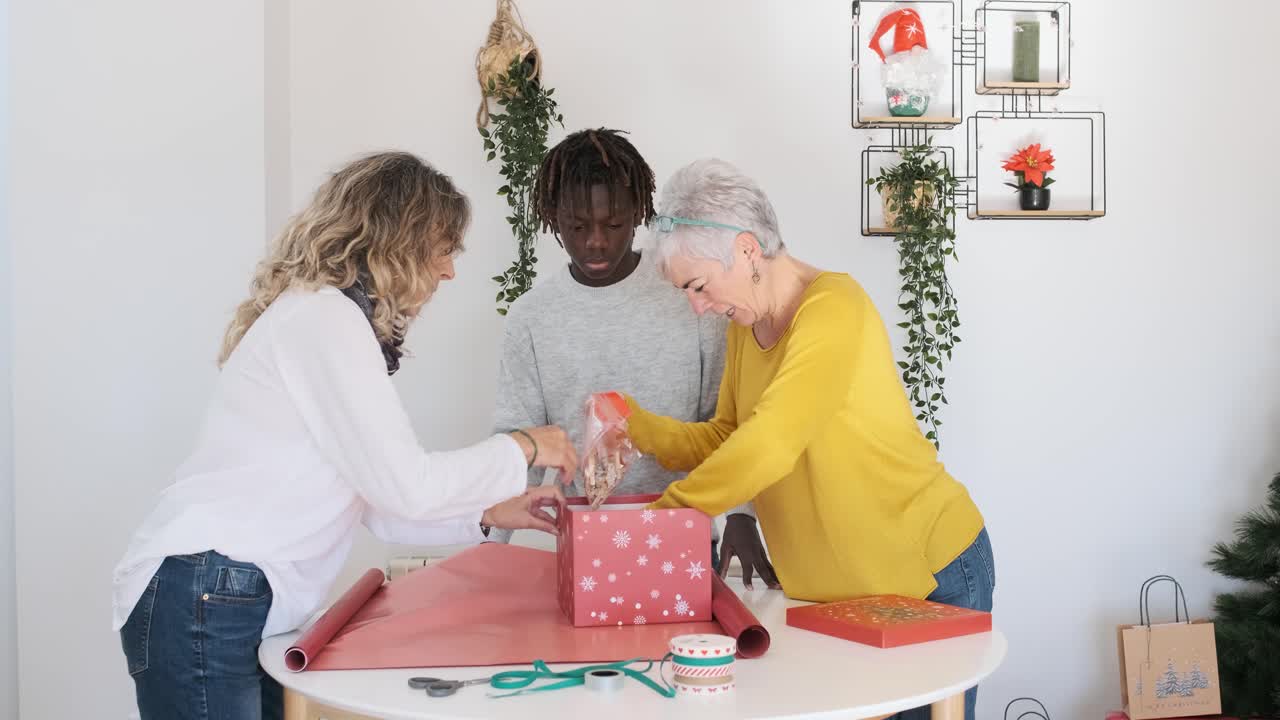 People wrapping gifts